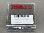 Thorlabs LA1213-ML Plano-convex Lens N-BK7 Mounted Uncoated 1/2". Fixed Price $22.95.