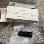 Elmo Micro Camera Lens 8797-1 F=25MM Macro Focus 0.33- X0.67 New In Box. Fixed Price $119.95.